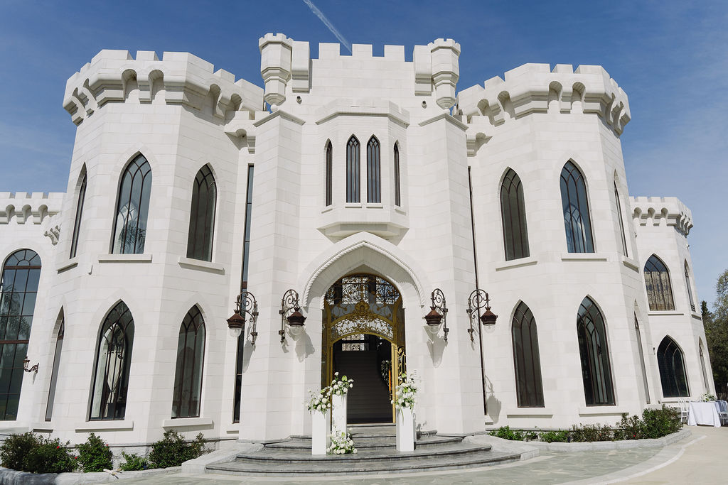 White Swan Castle wedding venue in Sacramento with grand entrance and gothic windows