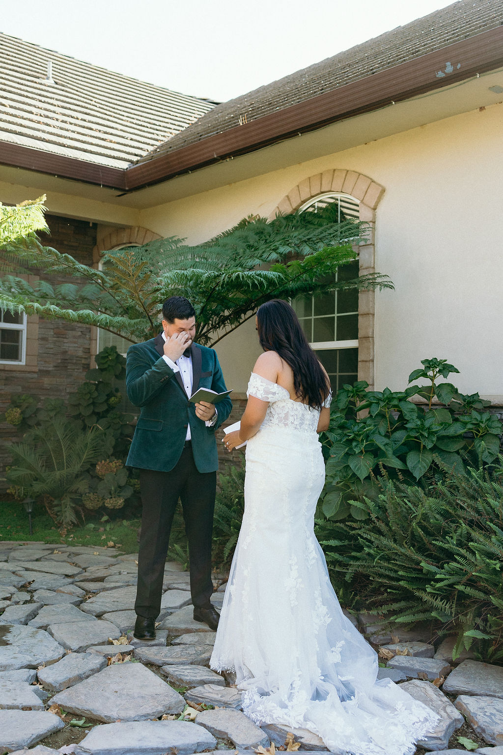 Emotional groom reading vows to the bride outdoors at Wolfe Heights Wedding