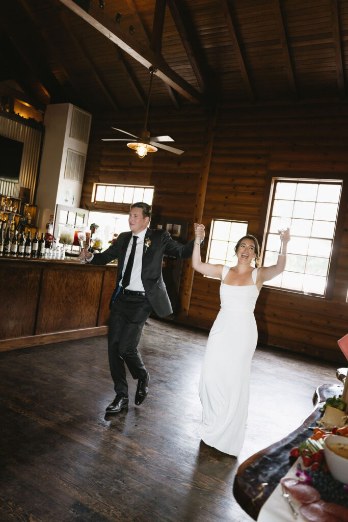 Bride and groom grand entrance into their wedding reception captured by a Northern California Wedding Photographer