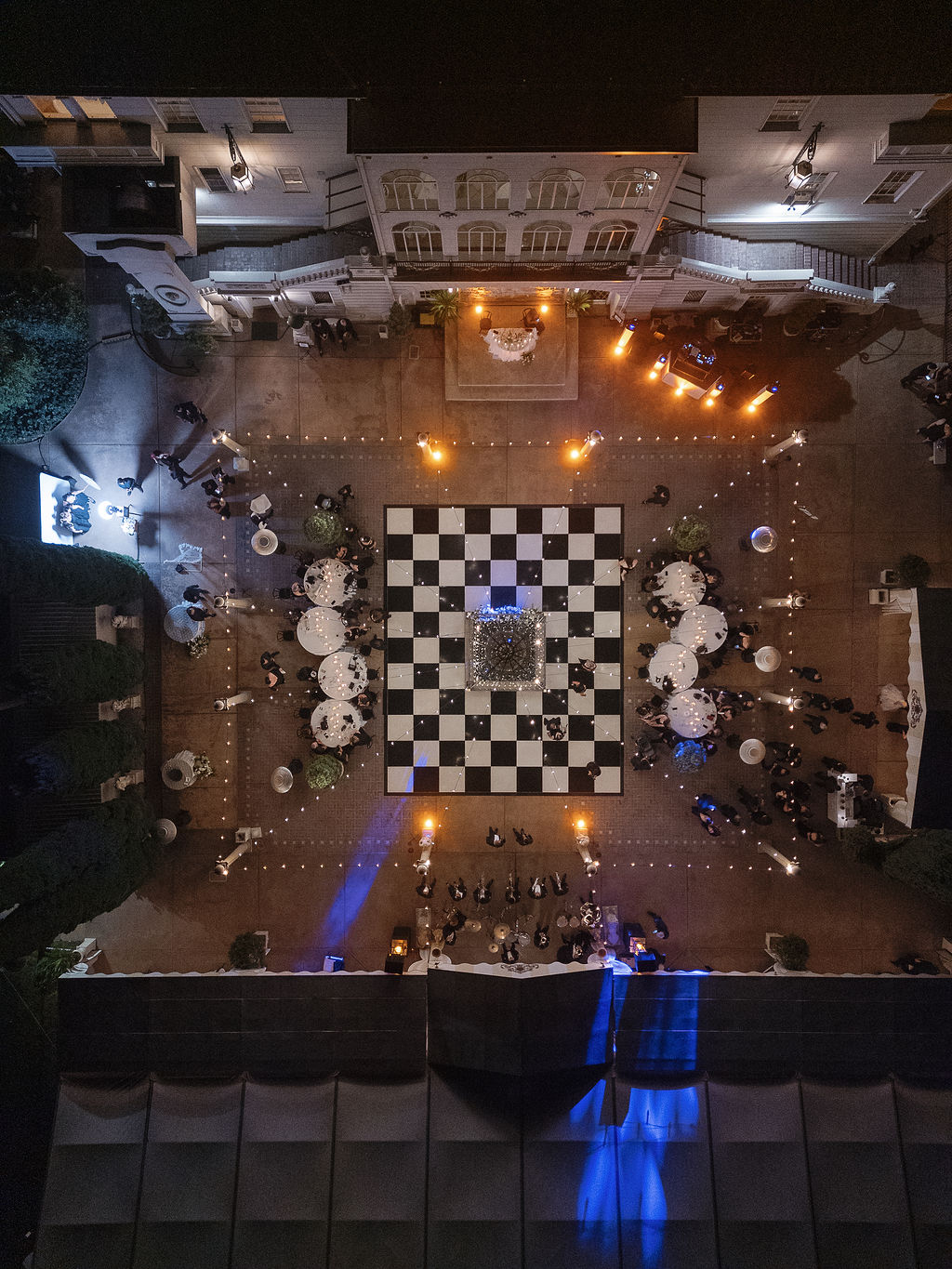 Aerial view of outdoor ceremony at Grand Island Mansion with bride and groom at the altar.