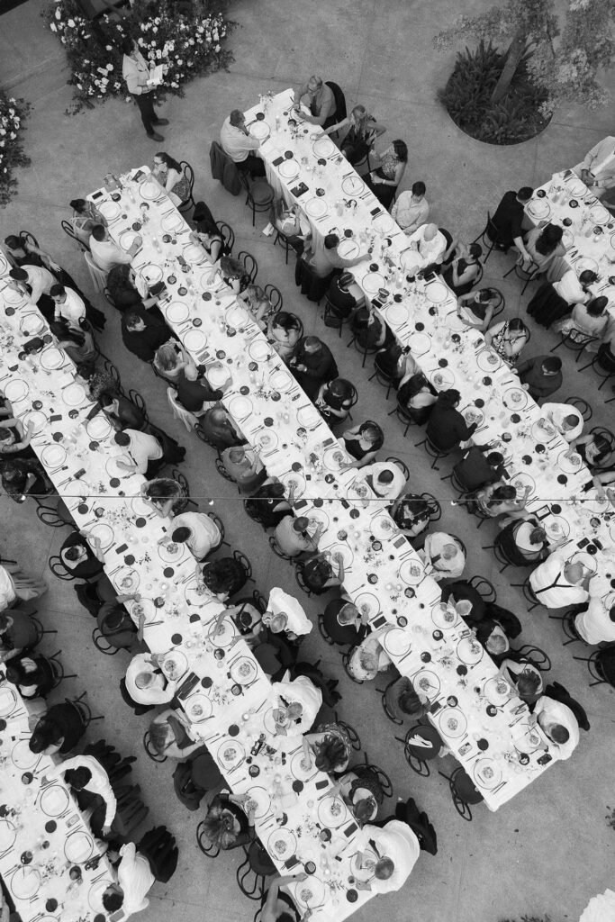Overhead black and white drone photo of long dinner tables at Park Winters wedding reception.